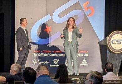 kelly hood on stage speaking cyber ab conference