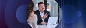 Tom Conkle speaking to clients in office